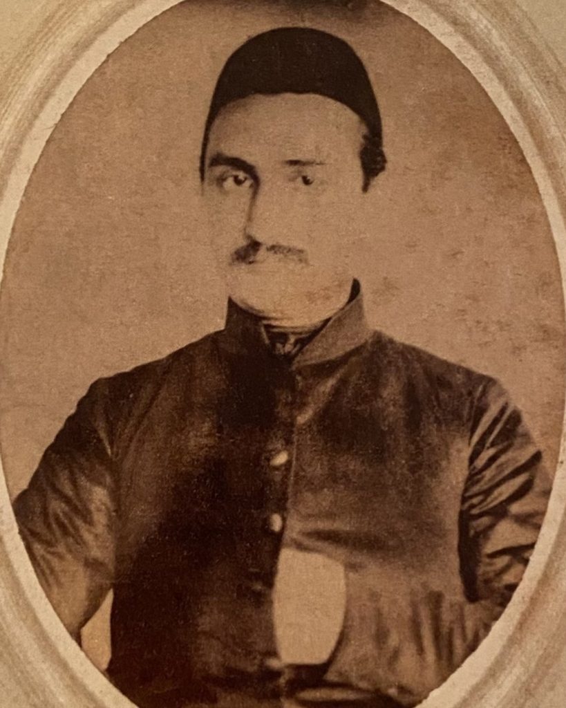 A sepia-toned formal portrait of Nigoğos Balyan, one of the leading Ottoman-Armenian architects from the Balyan family, whose visionary work defined the empire's 19th-century aesthetic.