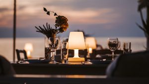 An unforgettable fine dining experience in Istanbul, where exquisite gastronomy meets a breathtaking sunset over the Bosphorus, creating the perfect romantic dinner setting.